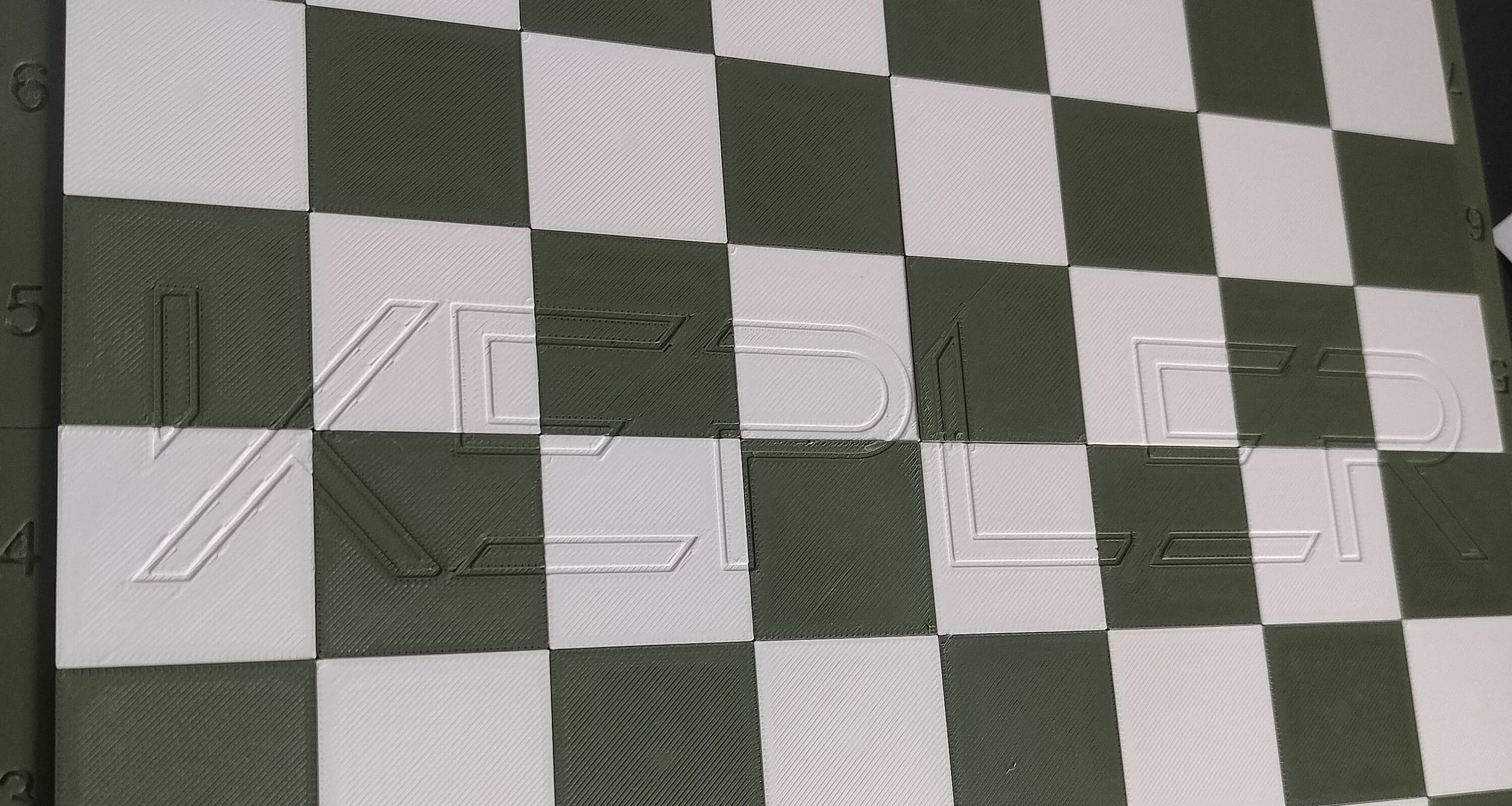 Logo embossed directly into a custom Printed Chess board
