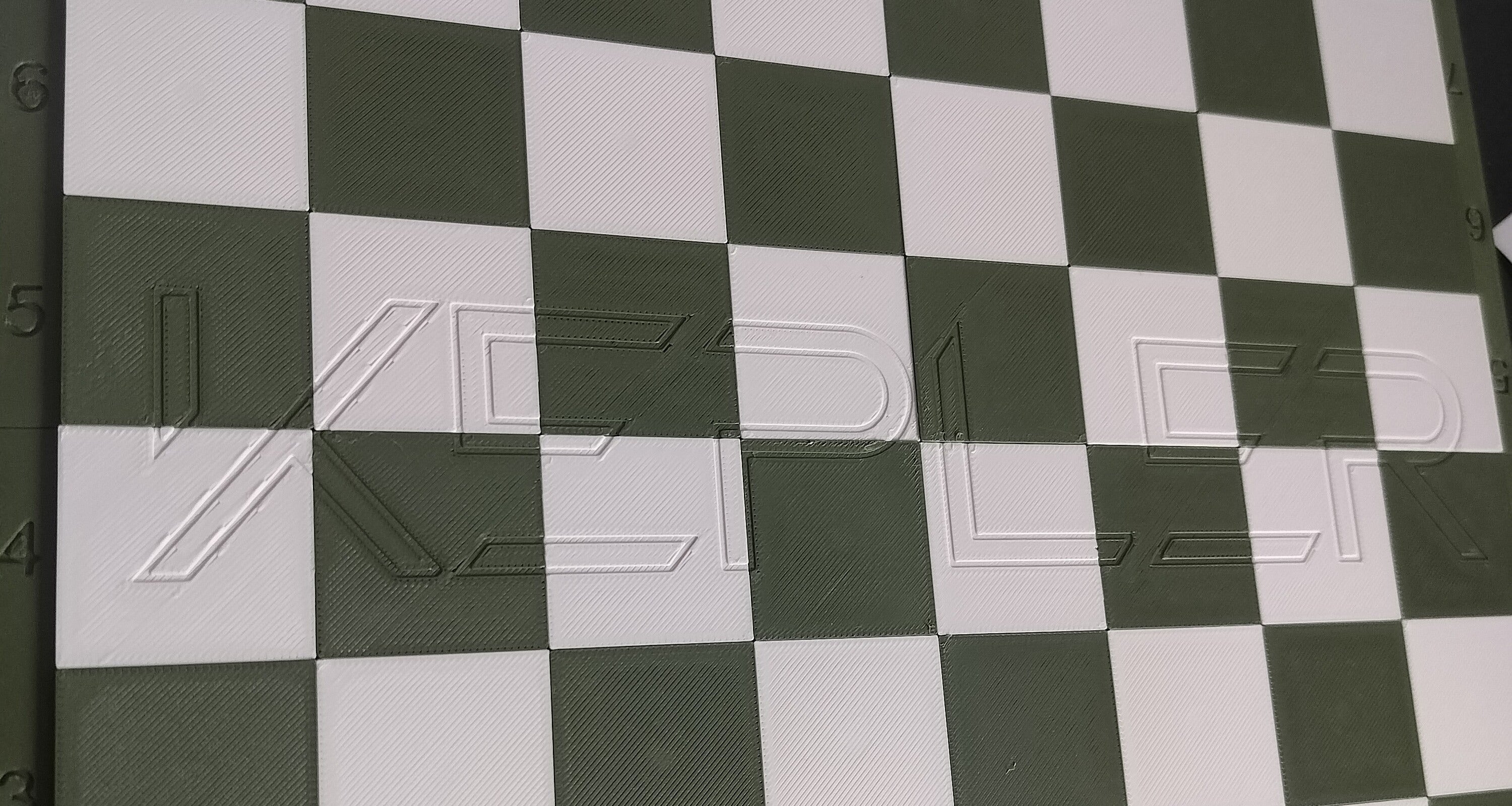 Logo embossed directly into a custom Printed Chess board